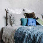 Coussin Goa pompons Lombok